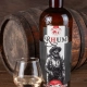 Bottiglia di Rhum invecchiato e bicchiere di rhum